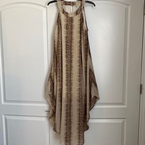 Sleeveless snake print maxi dress.